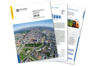 Drei Seiten des Wirtschaftsberichtes 2016 übereinander gelegt. Sichtbar ist ein Luftbild von Leipzig und Teile von Texten und Grafiken aus dem Bericht.