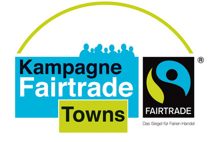 Logo der Kampagne "Fairtrade-Towns" mit entsprechendem Schriftzug sowie dem Fairtrade-Siegel.