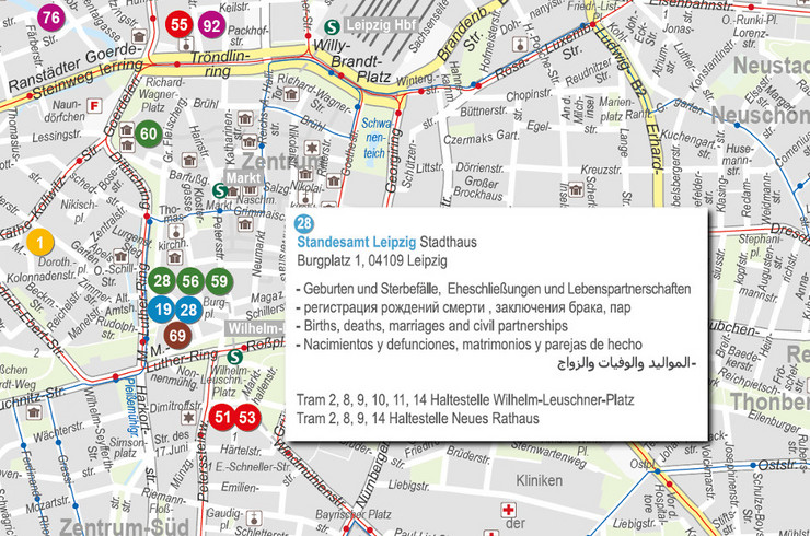Ausschnitt aus einem Stadtplan mit verschiedenen Markierungen und einer Erläuterung in mehreren Sprachen