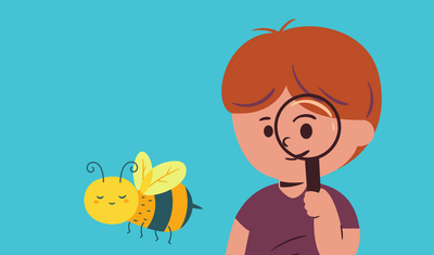 Ein Kind betrachtet eine Biene mit einer Lupe